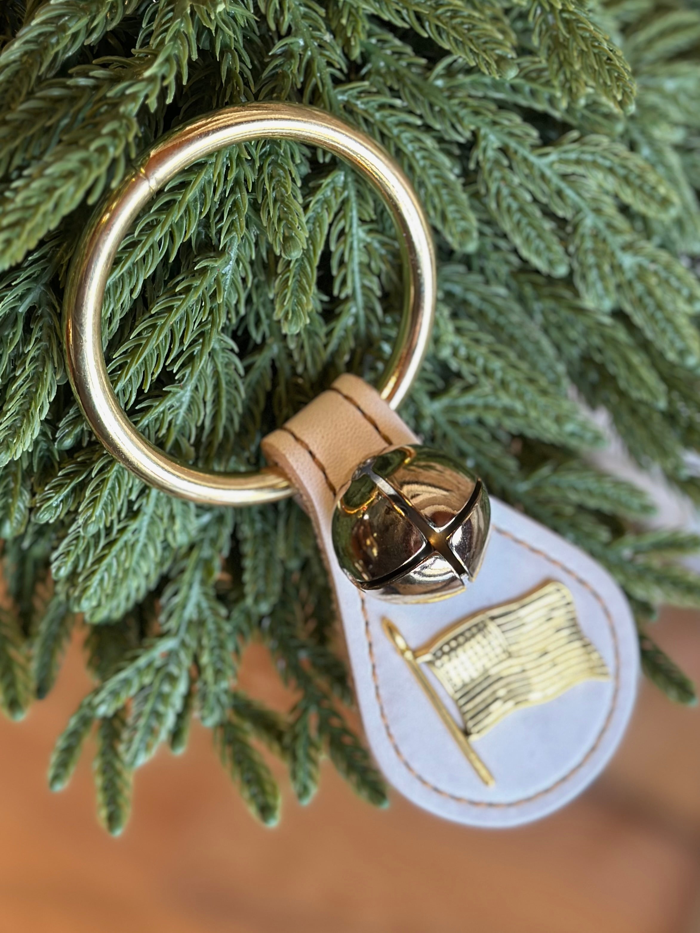 Flag with Single Brass Bell on Ring- White Leather
