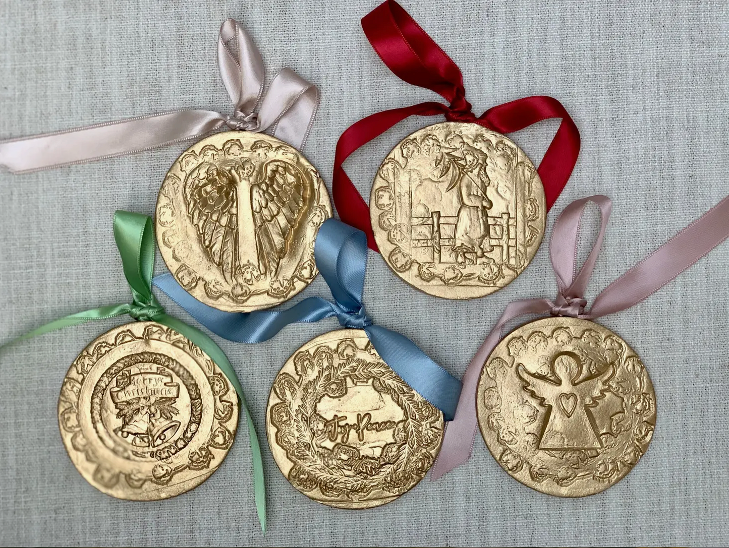 Round Gold Nativity Ornament w/ Burgundy Ribbon