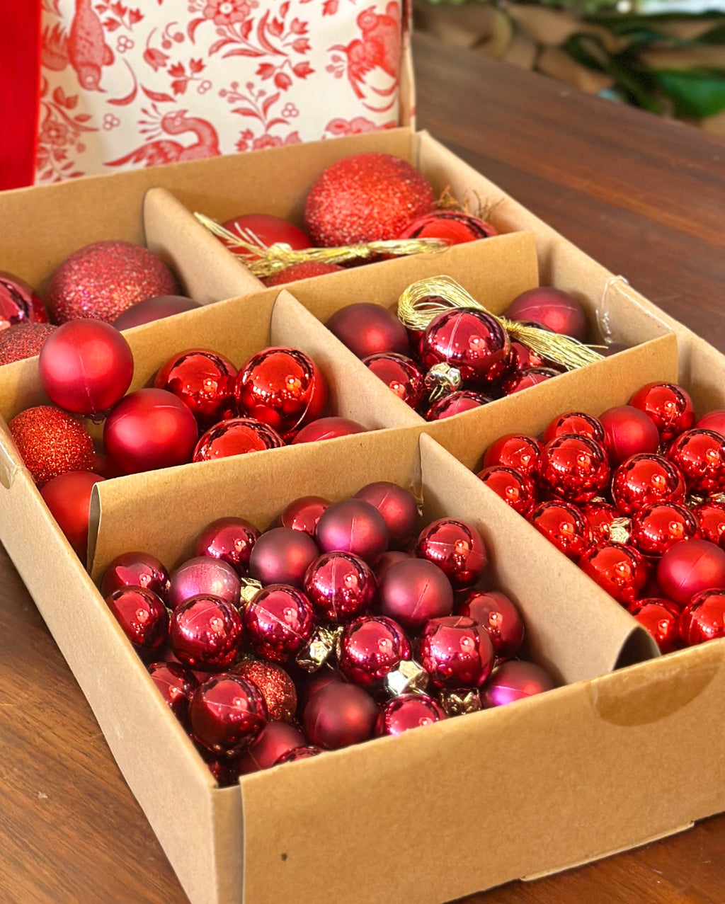 Box of Mixed Red Ornaments