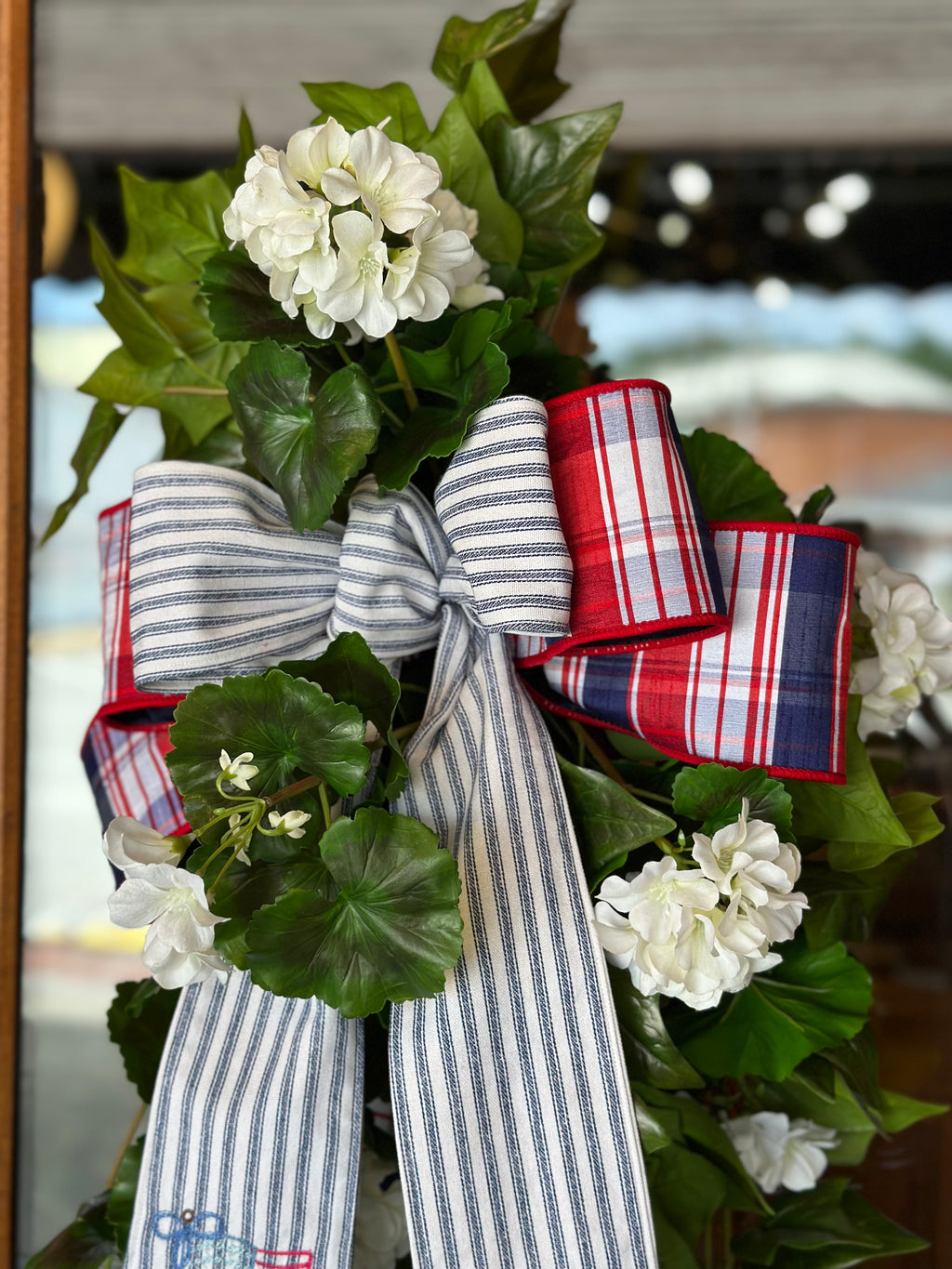 UV-Protected White Geranium and Ivy Swag with Embroidered American Flag Sash