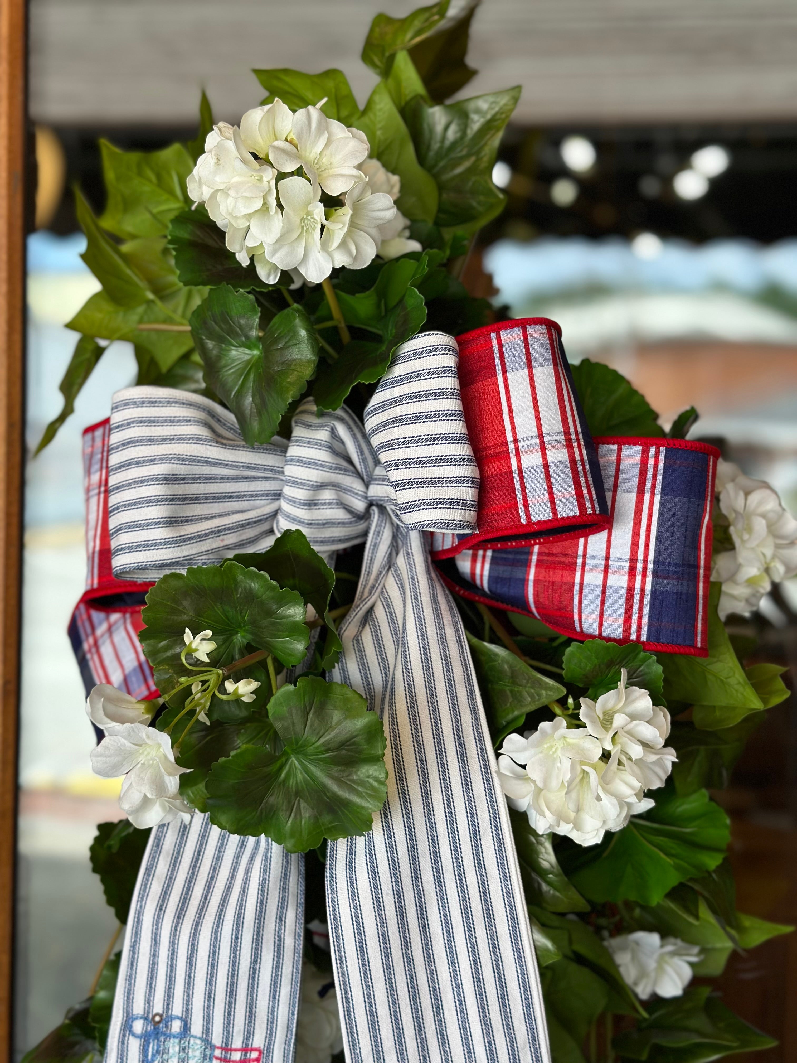 UV-Protected White Geranium and Ivy Swag with Embroidered American Flag Sash