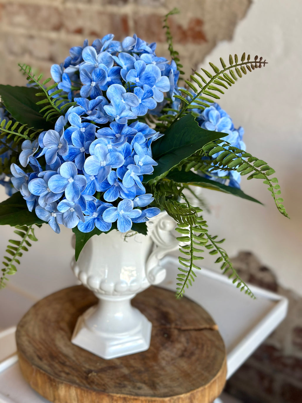 Blue Hydrangea Fern in White Handled Vase