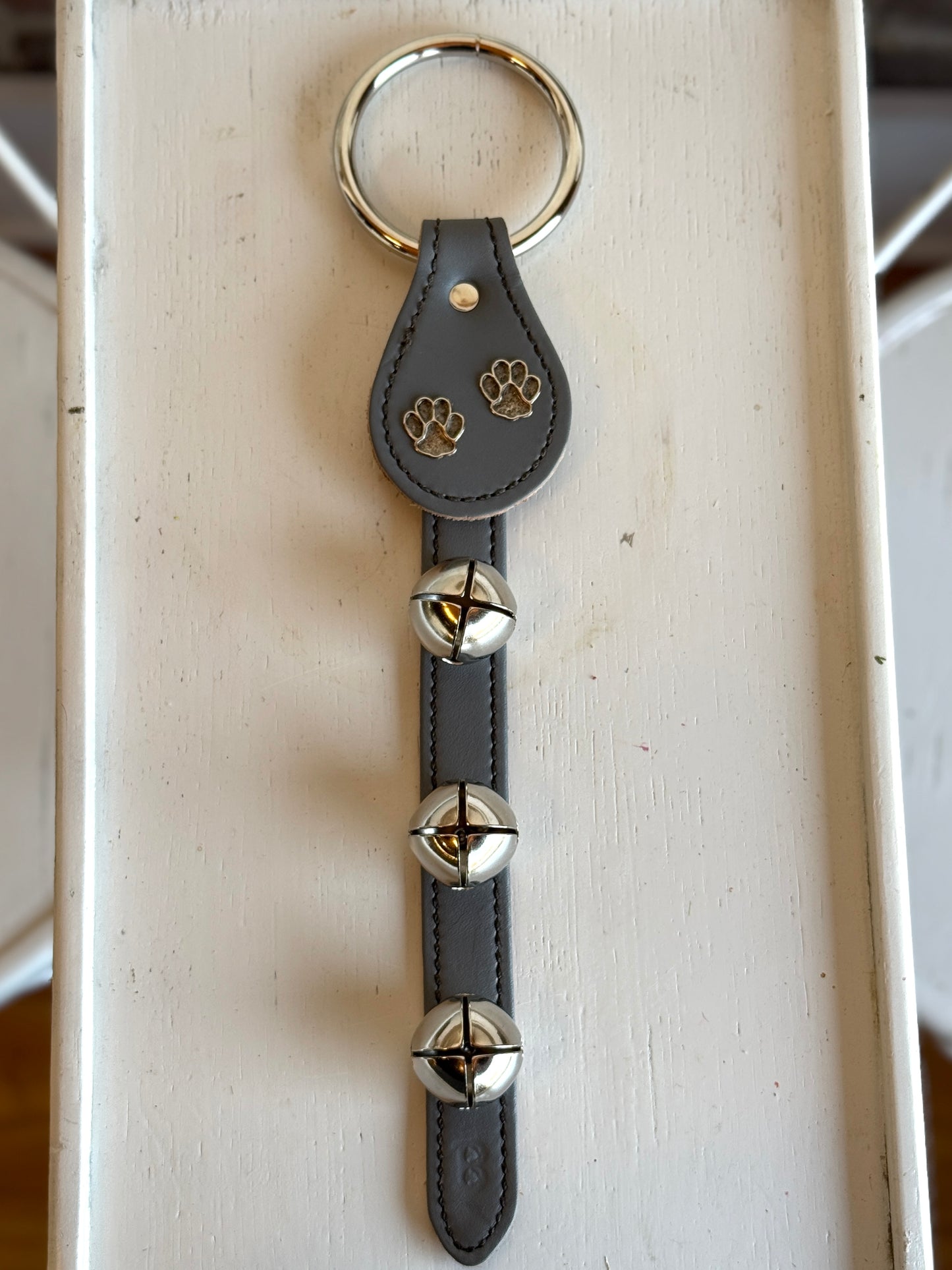 Belsnickel - 15” Paw Prints on Grey Leather Strap w/ 3 Nickel-Plated Bells