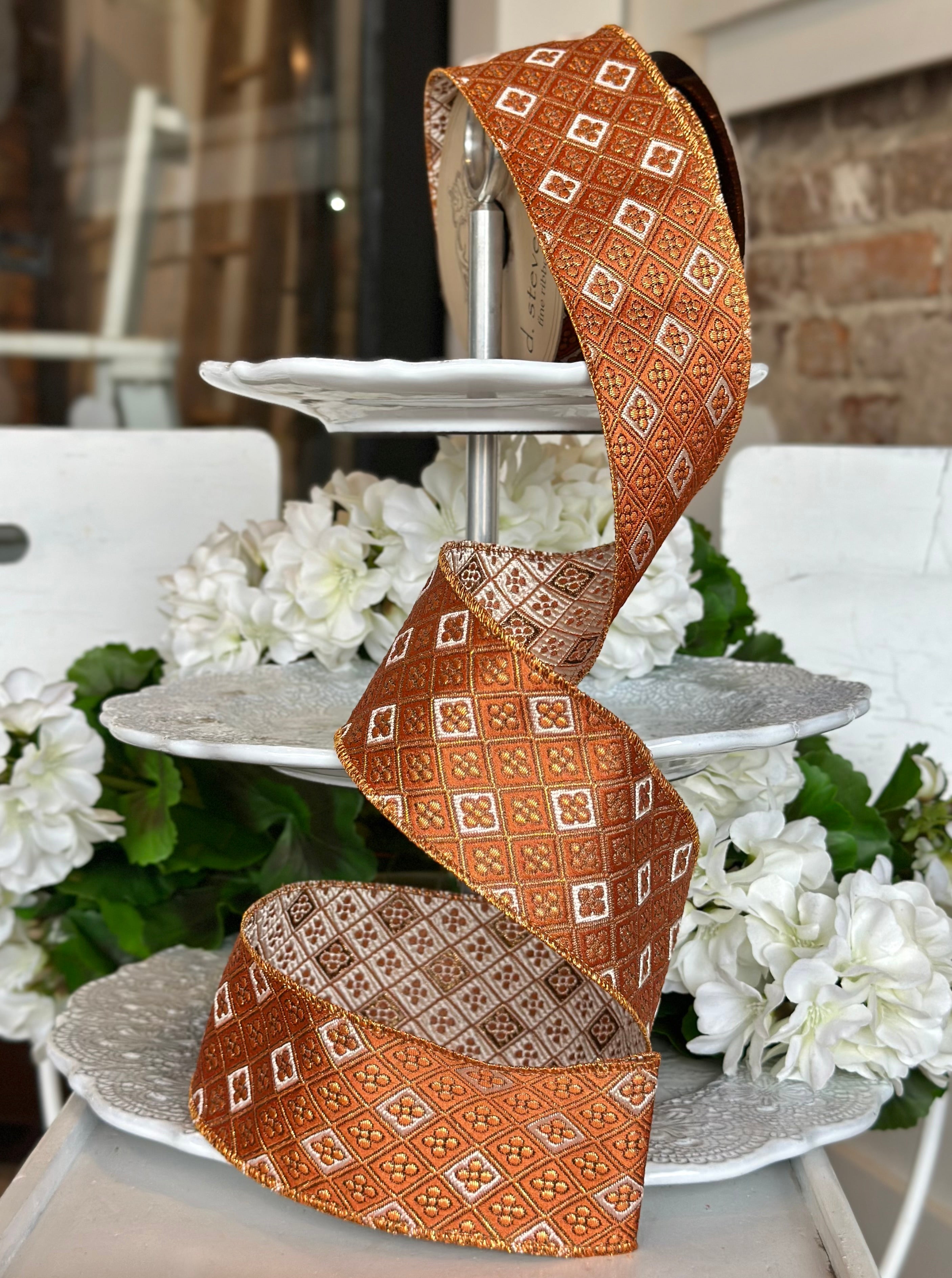 2.5" wide, jacquard diamond floral orange/copper