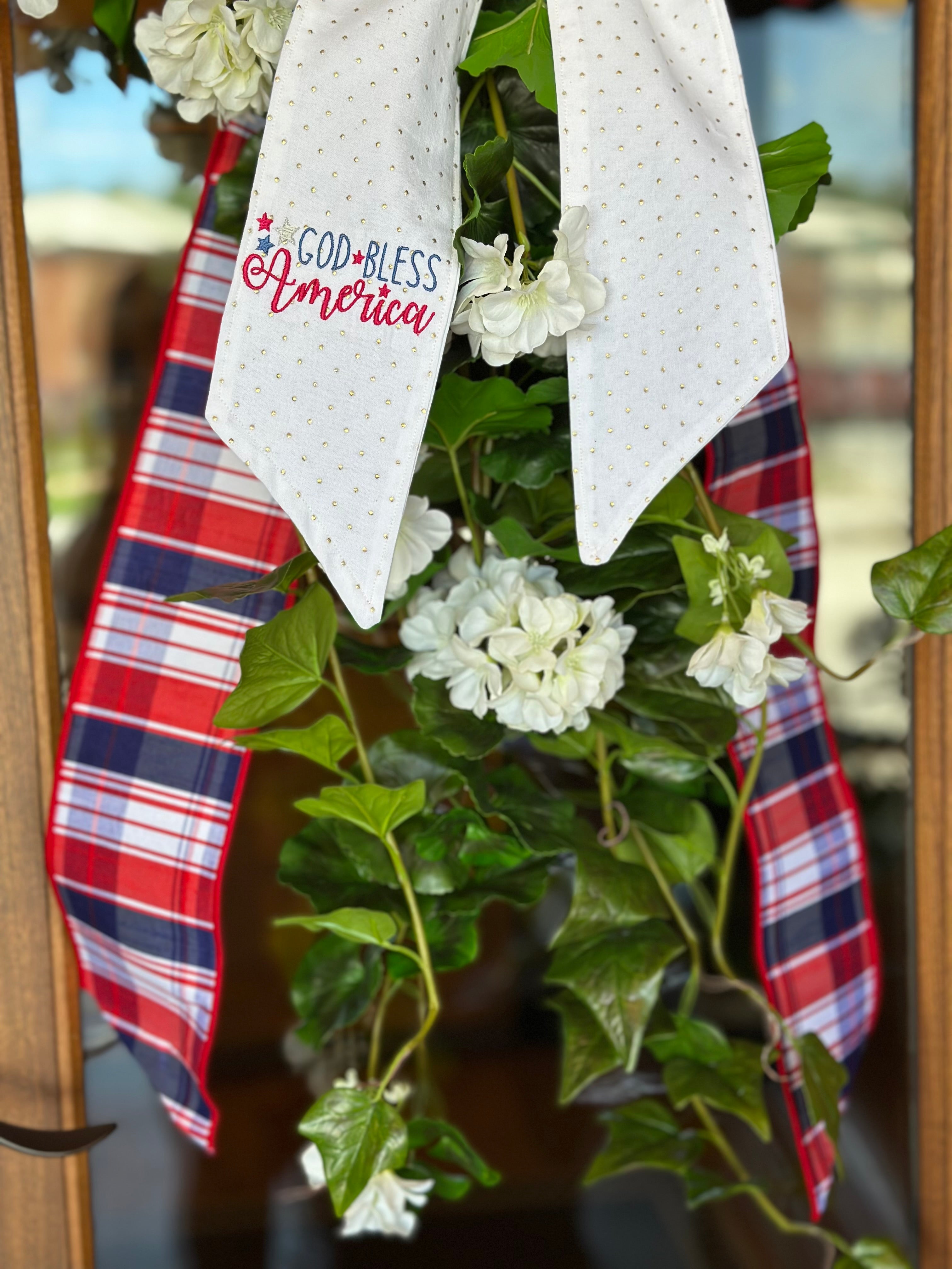 UV-Protected White Geranium and Ivy Swag with Embroidered “God Bless America” Sash