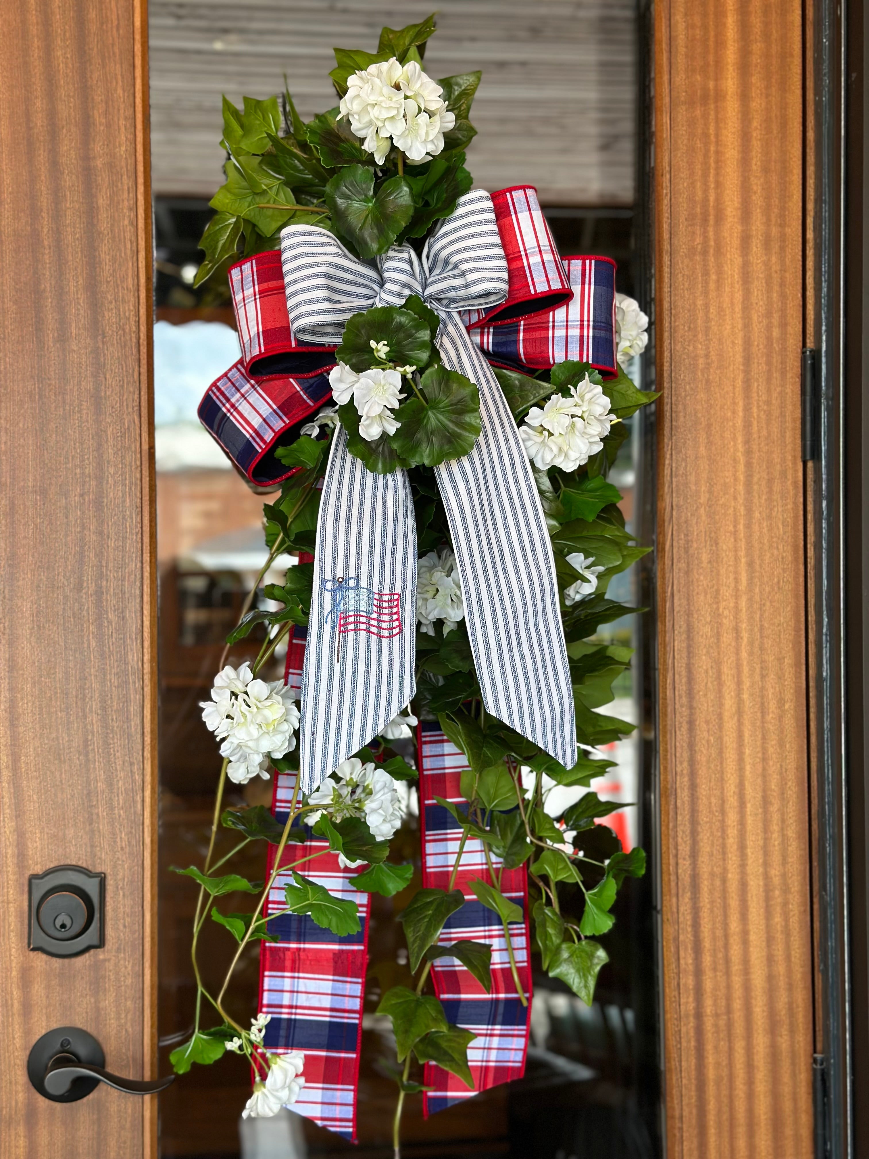 UV-Protected White Geranium and Ivy Swag with Embroidered American Flag Sash