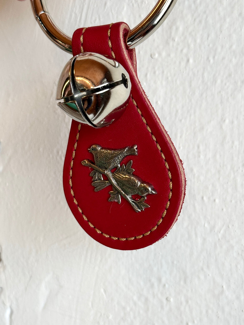 Belsnickel - Single Nickel-Plated “Tear Drop” Bell w/ Birds on a Branch, Red Leather on Ring