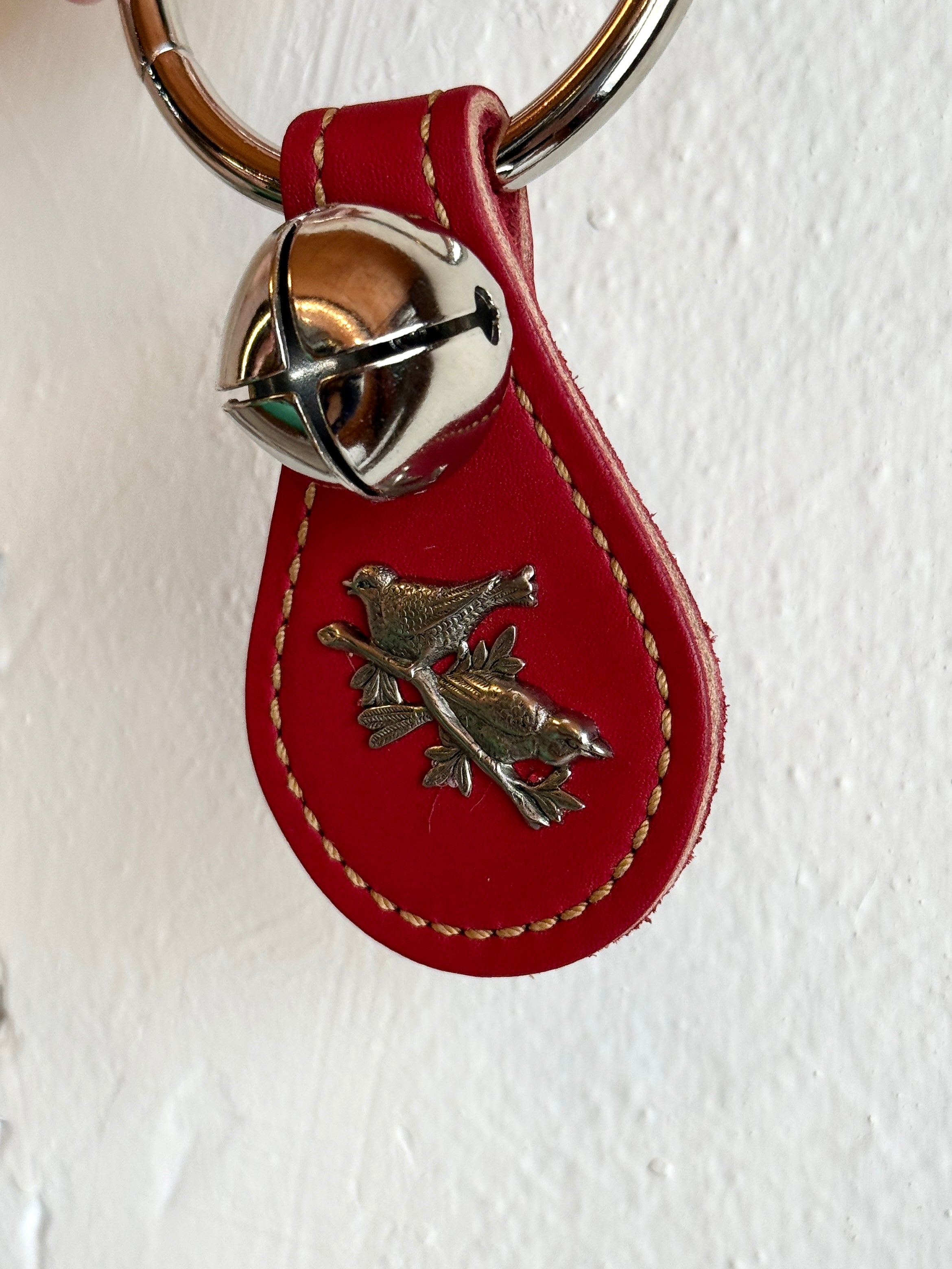 Belsnickel - Single Nickel-Plated “Tear Drop” Bell w/ Birds on a Branch, Red Leather on Ring