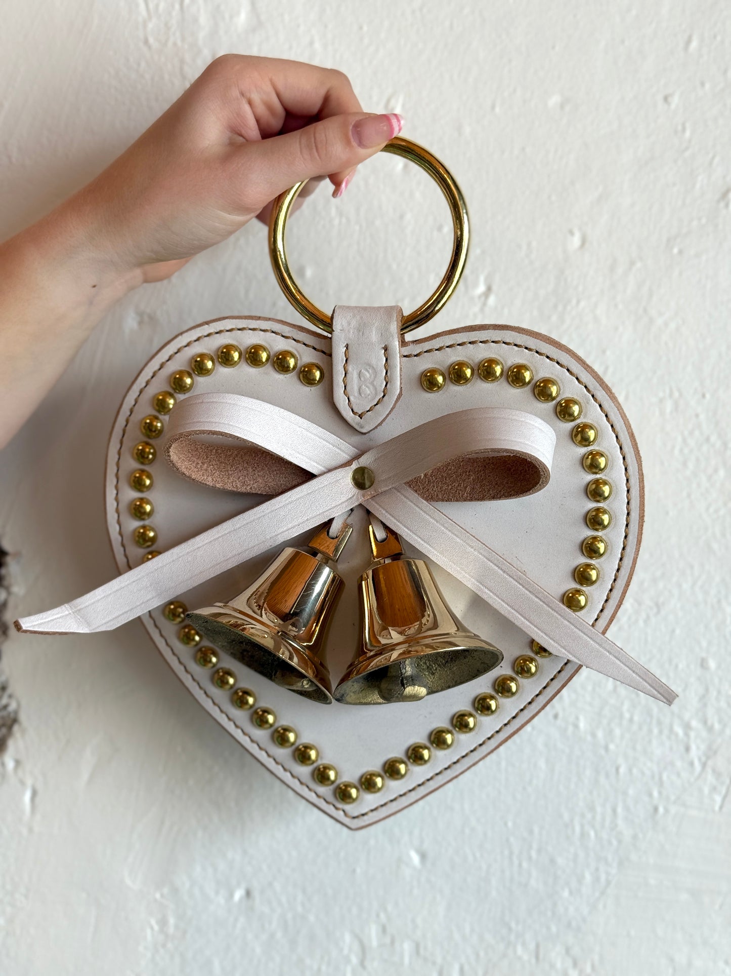Belsnickel - 2 Solid Brass Lancaster Bells on An Ivory Leather Heart w/ Bow
