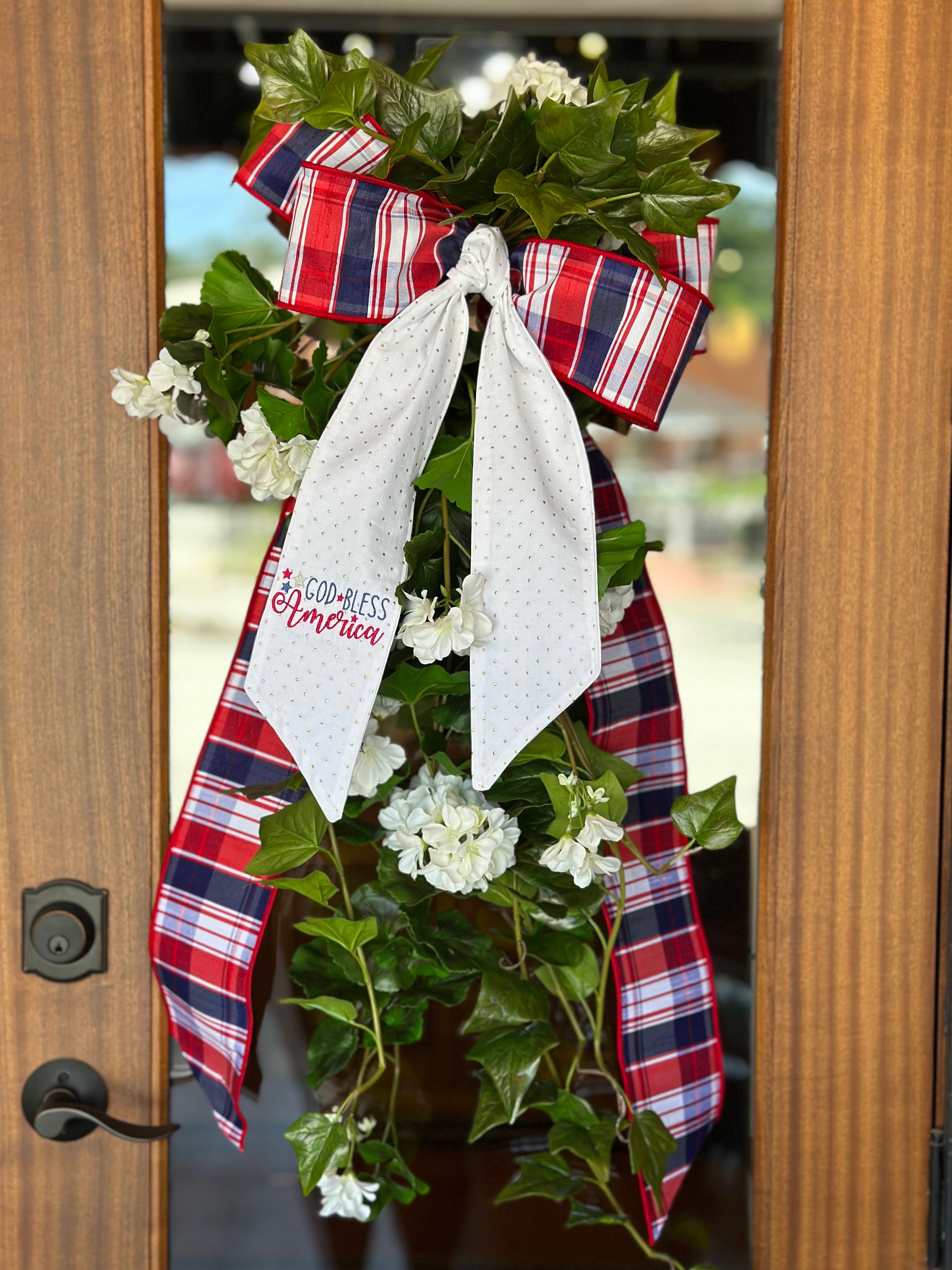 UV-Protected White Geranium and Ivy Swag with Embroidered “God Bless America” Sash