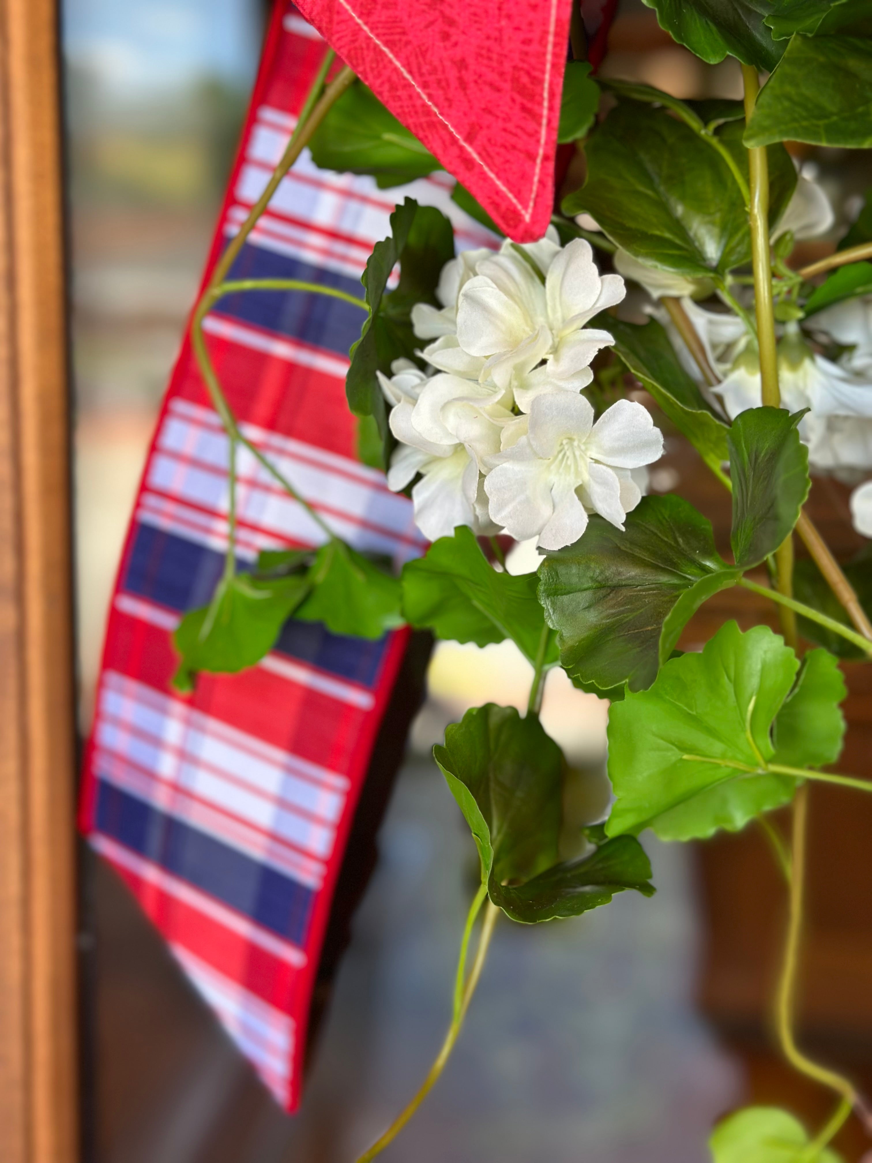 UV-Protected White Geranium and Ivy Swag with Embroidered Initial Sash