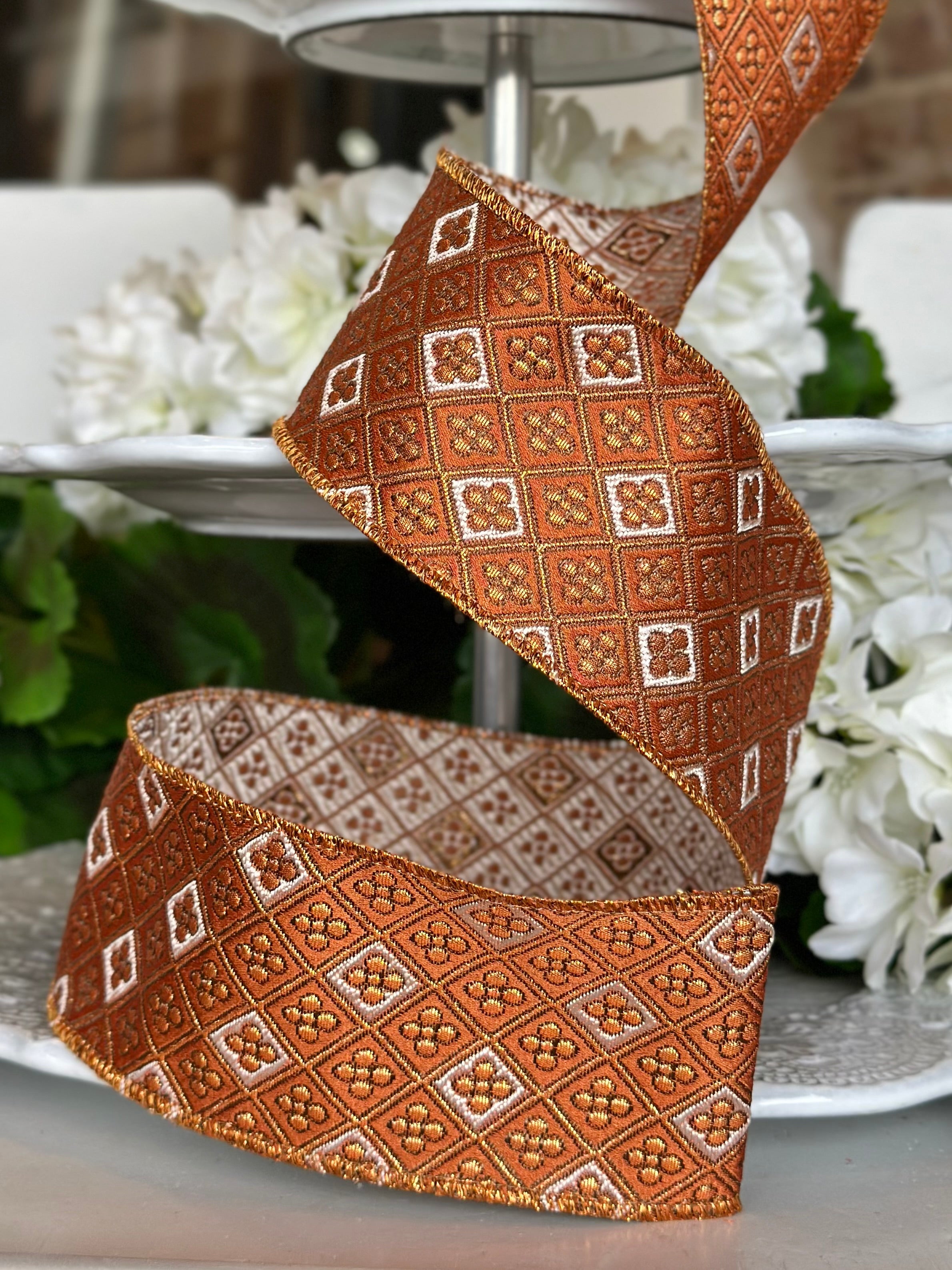 2.5" wide, jacquard diamond floral orange/copper