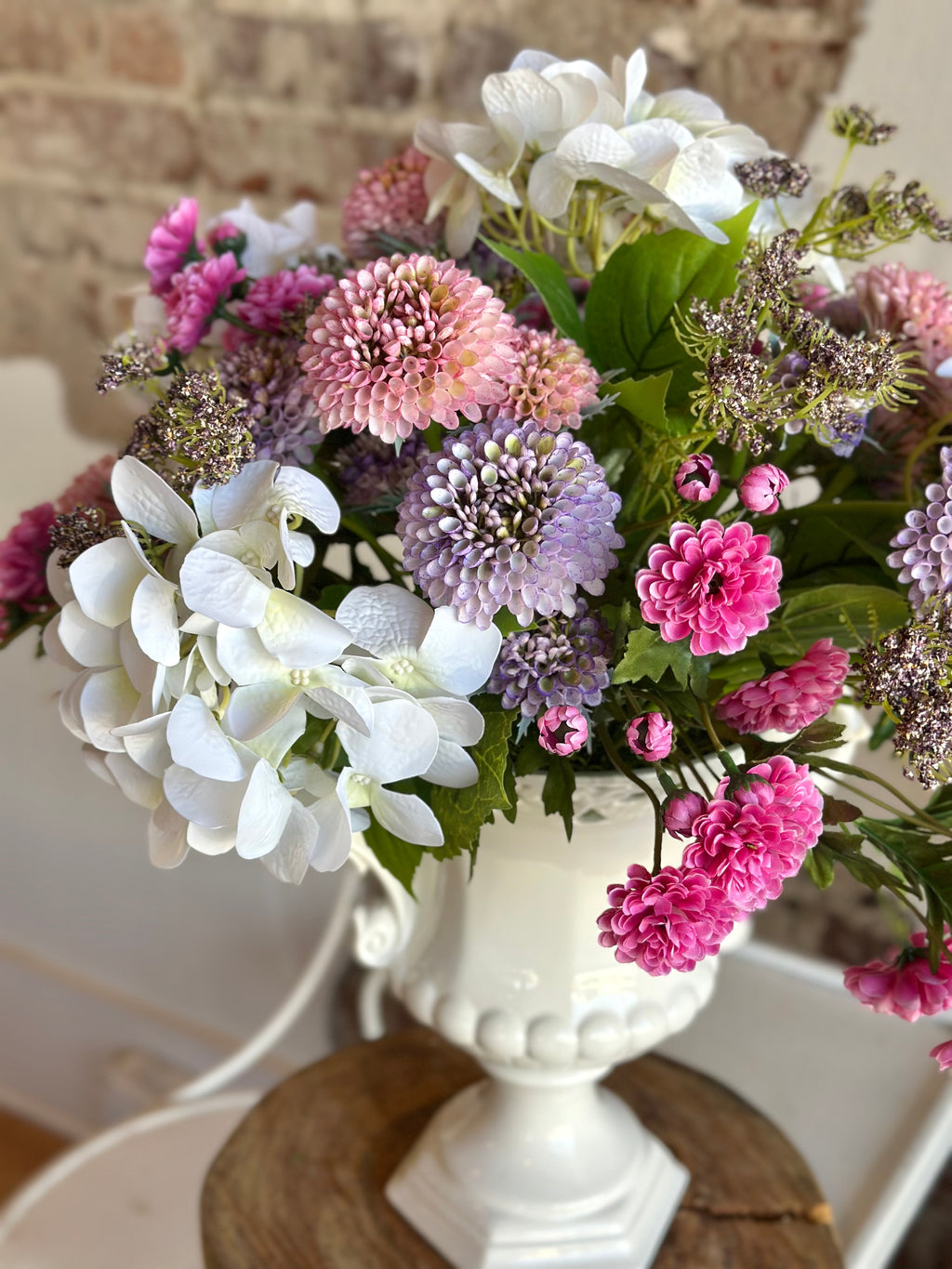 White Hydrangea & Pink/Purple Scabiosa in White Handle Vase