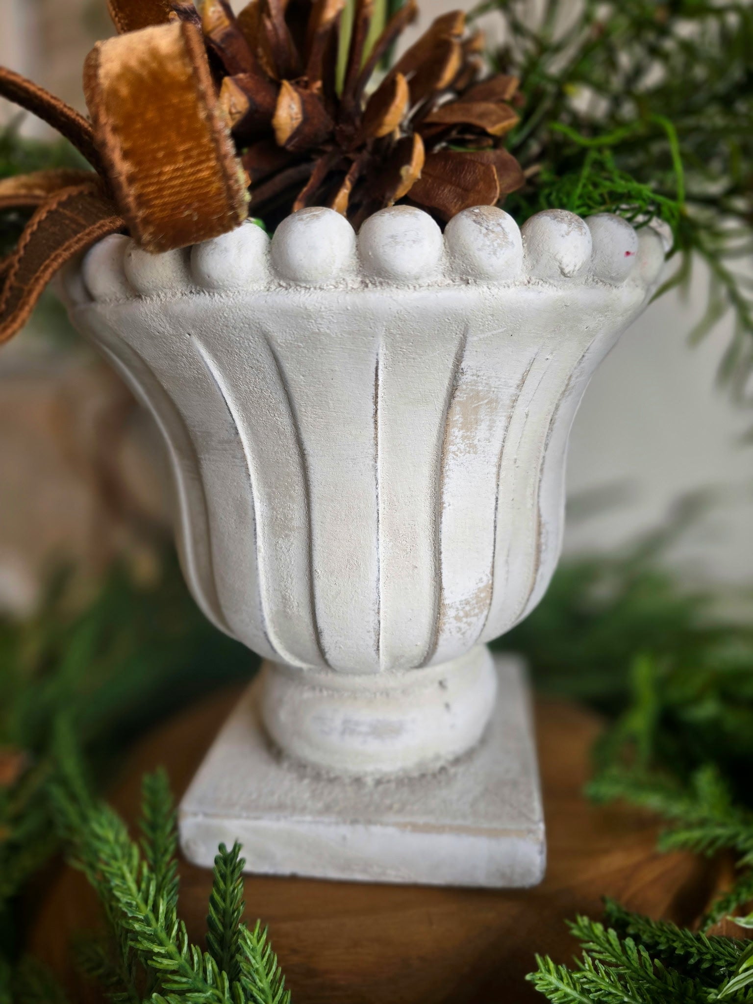 Classic Paperwhite and Pinecone in White Urn