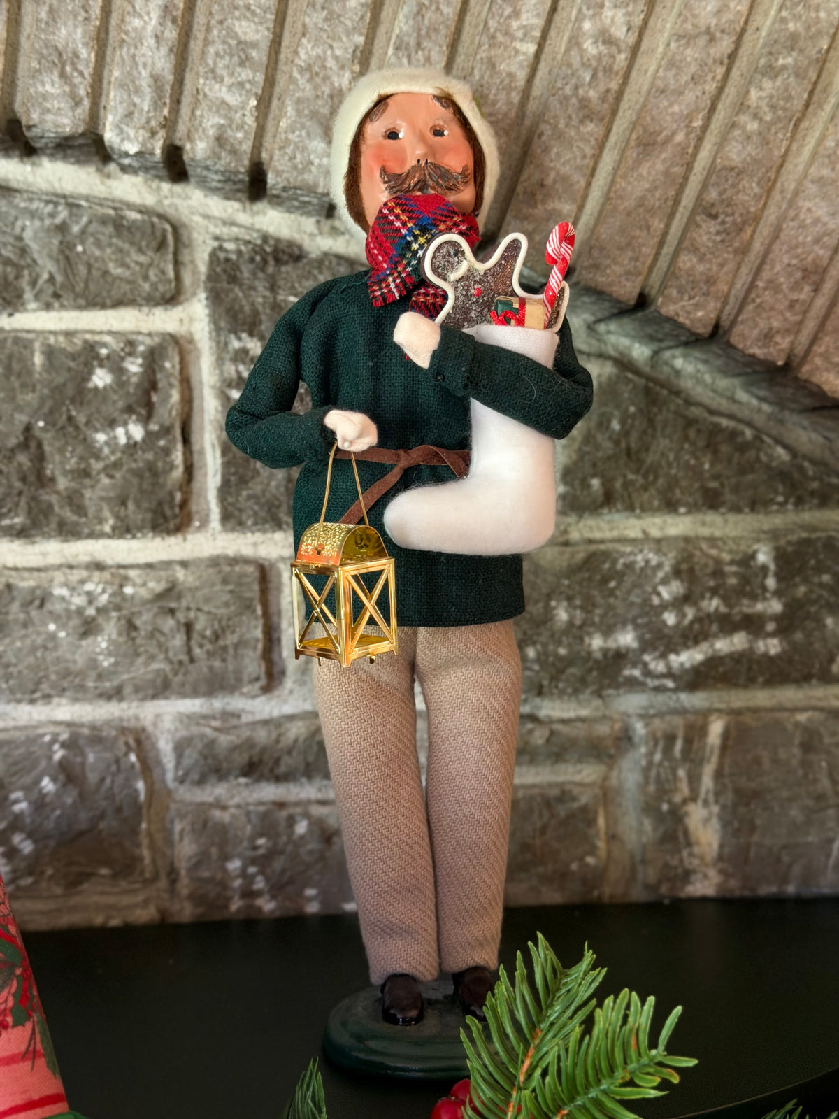 Byers’ Choice Family with Stocking Man