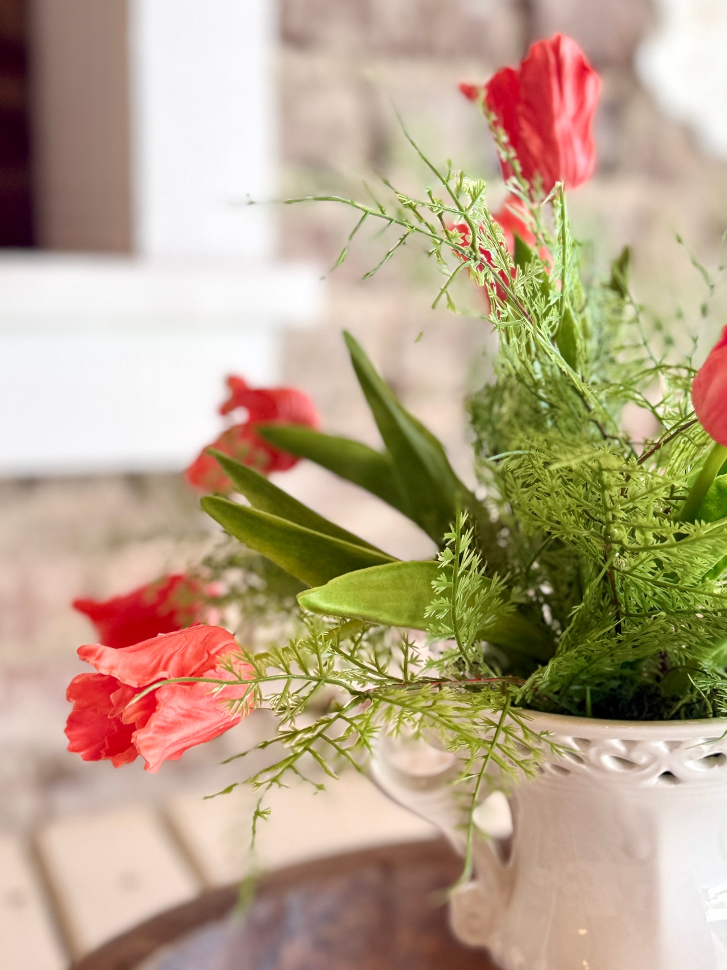 Tulips & Fern Arrangement in White Trophy Vase