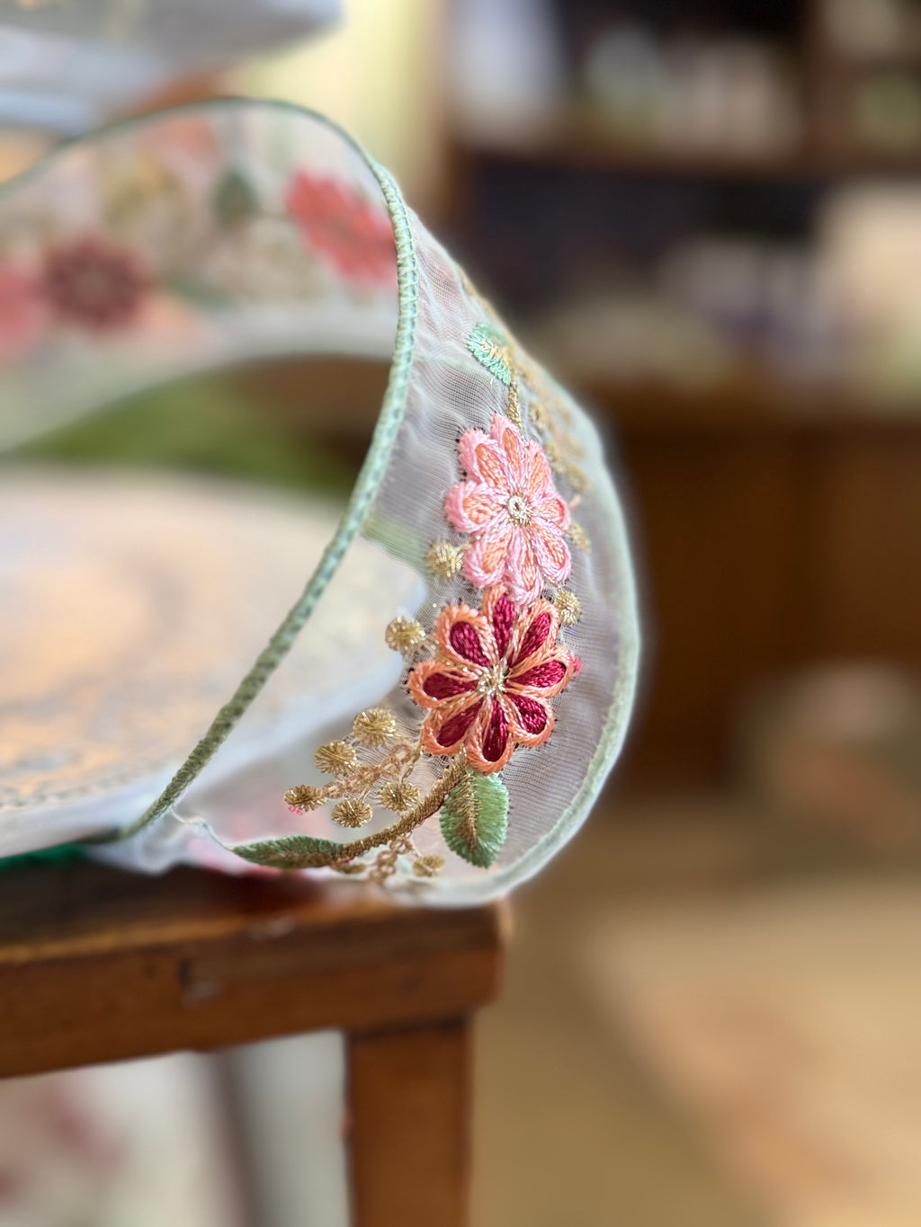 2.5" x 10yds sheer pink floral trim, celadon